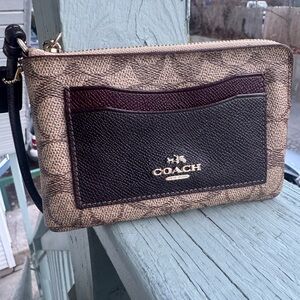Coach Black and Gold Zippered Pouch